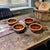 The Vintage Four USA Hull Glazed Pottery Onion Soup Handle Bowls are a charming addition to any table setting. Made in...