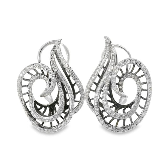 These designer French clip earrings are crafted in 18K white gold by Odelia and feature numerous brilliant round white...