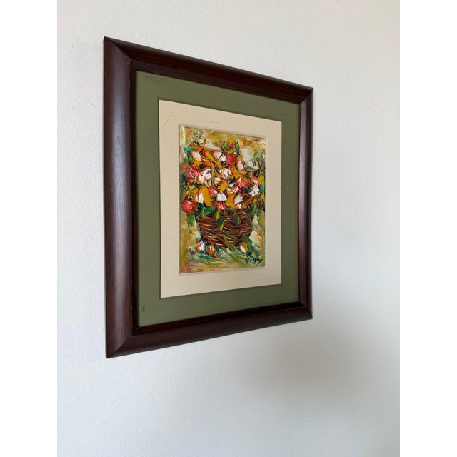 Expressive vintage still life oil painting on masonite depicting a vibrant basket of flowers rendered in a bold,...