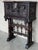 This Bargueno is embellished with a carving of Don Quixote de la Mancha bordered with branches of leaves. The desk is...