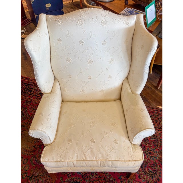 Hickory Chair Co White Wingback with Matching ottoman. Chippendale style legs, tone-on-tone needlework floral design...