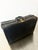 Iconic black leather Gucci suitcase ca. 1960s. Scuffs and wear throughout, great shape for its age. Original brass...