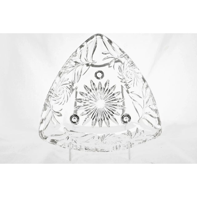 Vintage pair of sparkling triangular glass footed catchalls with a leaf and pinwheel cut pattern. They makes a wonderful...