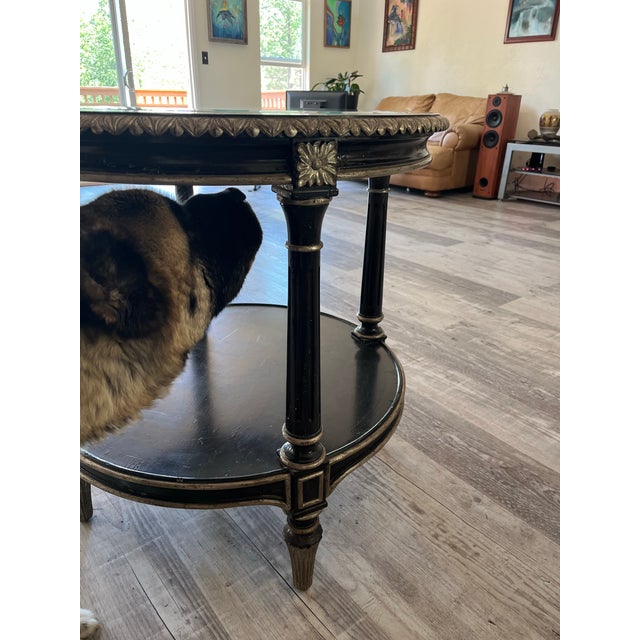 Elevate your living space with this striking Neoclassical style tiered round side table by renowned luxury maker Marge...