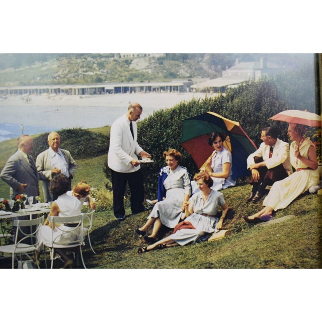 Print Sz: 13"H x 10"W Frame Sz: 14 3/8"H x 11 1/8"W w/ gilt bamboo frame Original color page from Slim Aarons' iconic book...