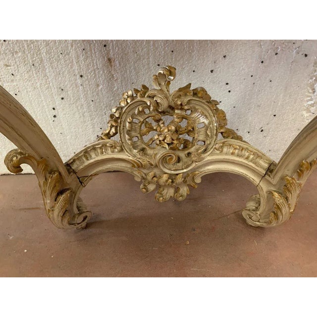 Very pretty console table carved in painted and gilded wood The apron is carved in openwork on three sides The carvings...