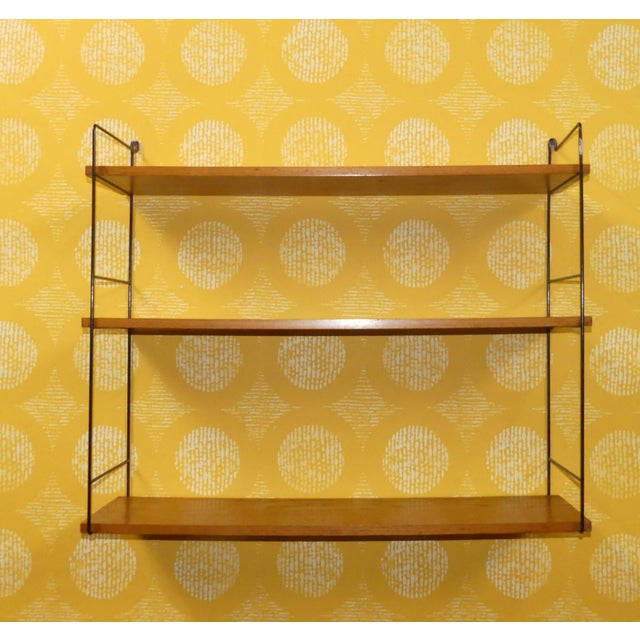 An absolute classic! Simple, Swedish design Design classic This shelf is a reproduction of the famous design by Nisse...