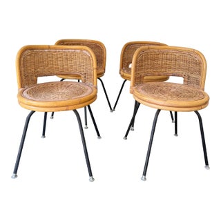 Mid 20th Century Danny Ho Fong Style Wicker and Iron Swivel Chairs - A Set of 4. For Sale
