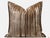 This square throw pillow is crafted from a warm brown velvet fabric, adorned with delicate vertical textures that reflect...