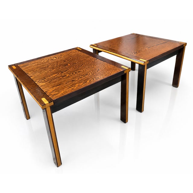 Exceptional pair of Mid-Century Modern side tables showcasing dramatically figured zebrawood and sophisticated contrasting...