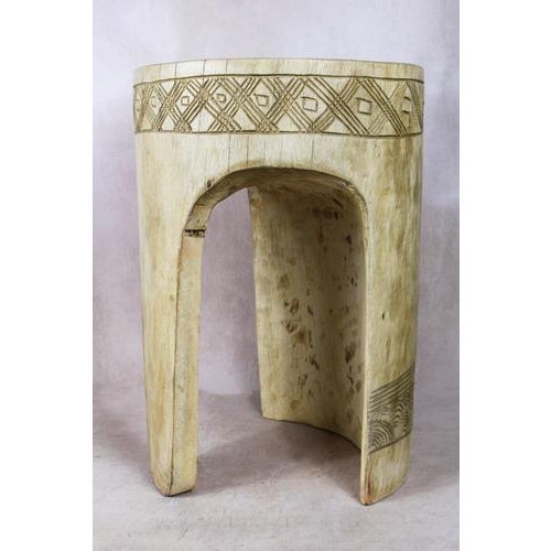 Introduce a touch of African elegance into your living space with this remarkable solid wood carved side table\.tool from...