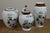 Elegant three-piece Kutani-style porcelain ginger jar vase set, beautifully decorated with traditional Japanese birds and...