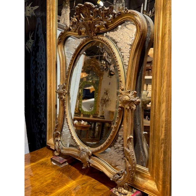 19th century French Louis XV style giltwood and etched glass mirror. Very stunning in person. Circa 1870. 35h x 27.5w