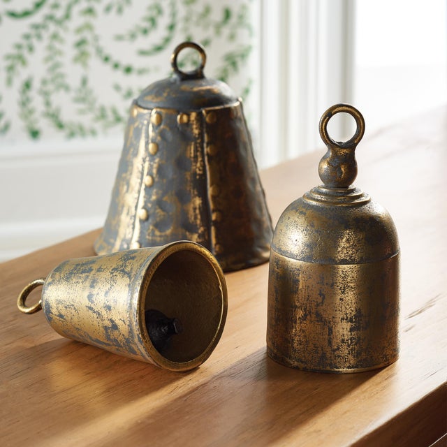 Old fashioned objets in cast aluminum, these historic shapes are functioning bells. Place atop a stack of art books on the...