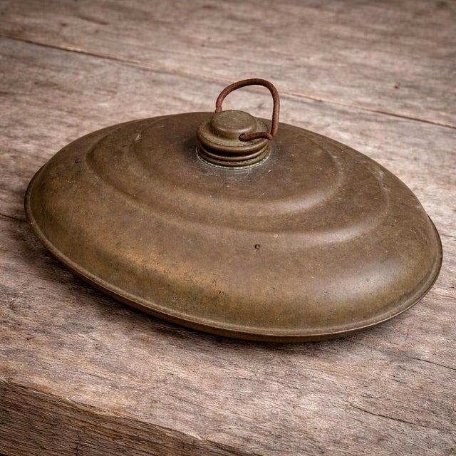Antique brass bed warmer or early hot water bottle with classic oval form and original screw cap. Beautiful aged patina...