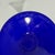 Striking pair of signed art glass martini/cocktail glasses designed by Shafaq Malik. Each glass features a clear flared...
