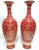 Pair of huge ceramic vases of Italian production from the 1960s, made of polychrome red and gold ceramic, with relief...