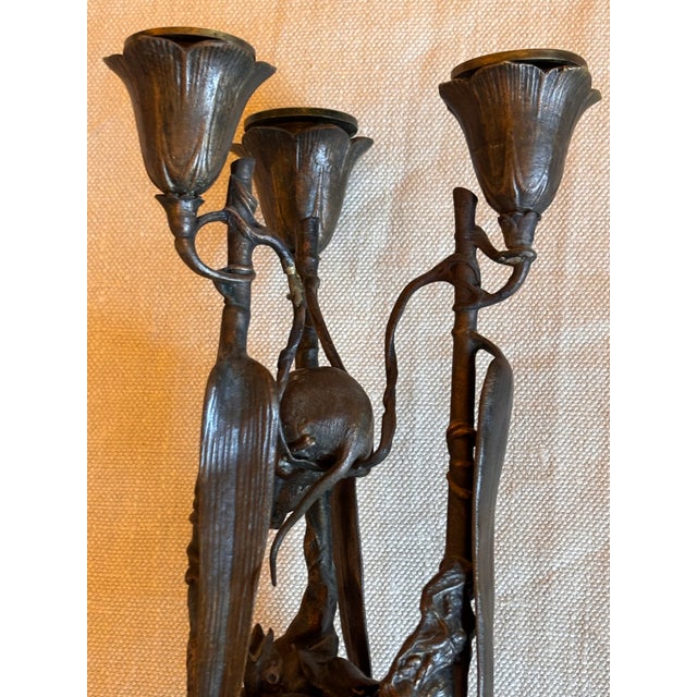 20” height x 7” x 7” 3 candlelight patinated bronze candelabra depicting baby birds being fed by Mama bird, the other...