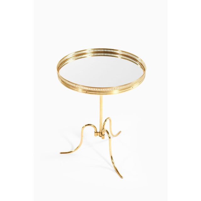 Very rare side / cocktail tables in brass and circular mirror glass top, 1940's additional information: material: brass...