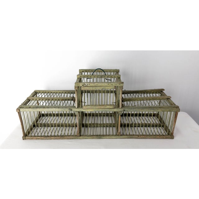 French bird-cage. The smallness of the cage is explained by the use of the cage to transport birds. It is divided into...