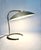 This funky sleek desk lamp features a very soothing space-age/Italian style silhouette with a dramatic crescent...