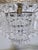 Vintage Hollywood Regency Floral Embossed Brass Tiered Waterfall Teardrop Chandelier For Sale - Image 9 of 10