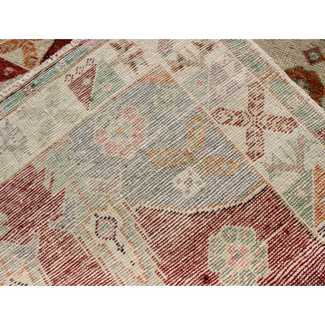 Vintage Turkish Oushak Rug With Deep Red Field and Soft Green and Peach Accents For Sale - Image 4 of 7