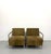 A sleek pair of MCM lounge chairs featuring clean architectural lines, brushed chrome tubular frames, and soft olive-brown...
