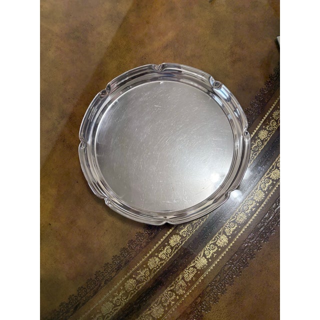 Beautiful Sterling Silver Serving tray. 8" round with simple but elegant dimples on the edges. Perfect piece to elevate...