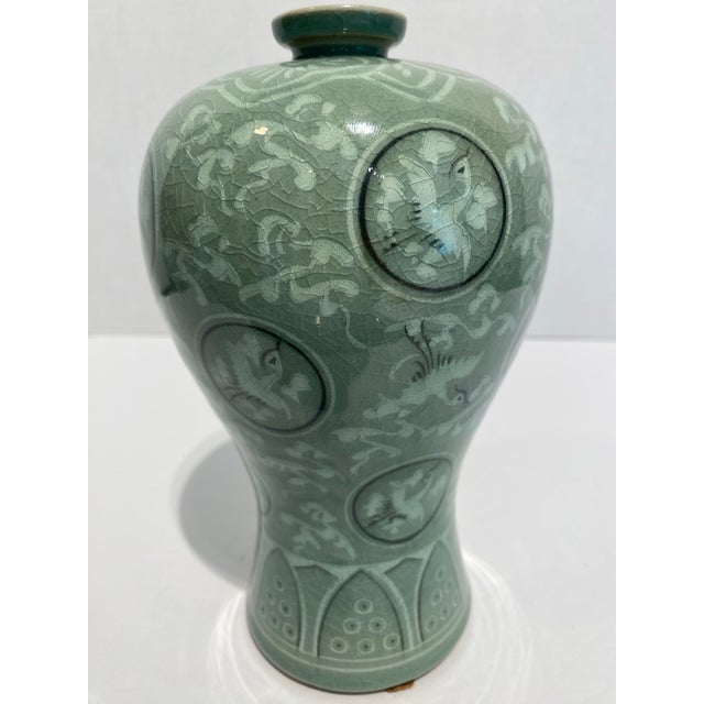 This is a gorgeous Cranes and Clouds Vase with a wonderful crackle glaze. This Maebyong vase is so lovely with its designs...