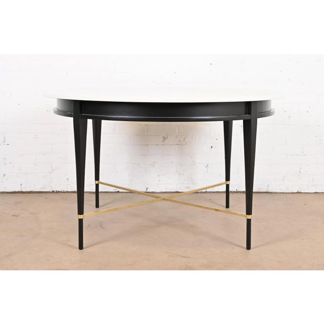 An exceptional Mid-Century Modern round dining table, game table, or center table By Paul McCobb for Directional and...