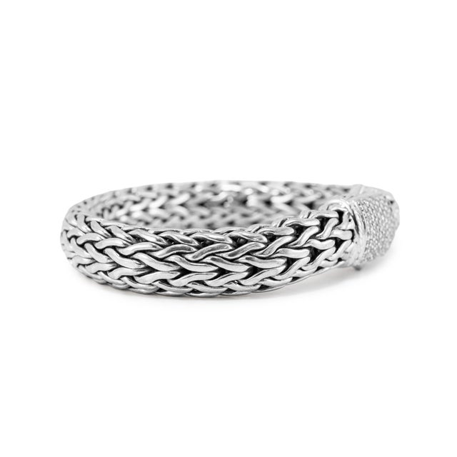 Brand: John Hardy Gender: Ladies Metal Type: Sterling Silver Length: 6.25 inches Thick: 10.5 mm Weight: 83.21 grams John...