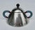 C.1980's; Michael Graves Design, for Alessi of Italy is this Memphis-style, lidded creamer with handles. This is INOX...