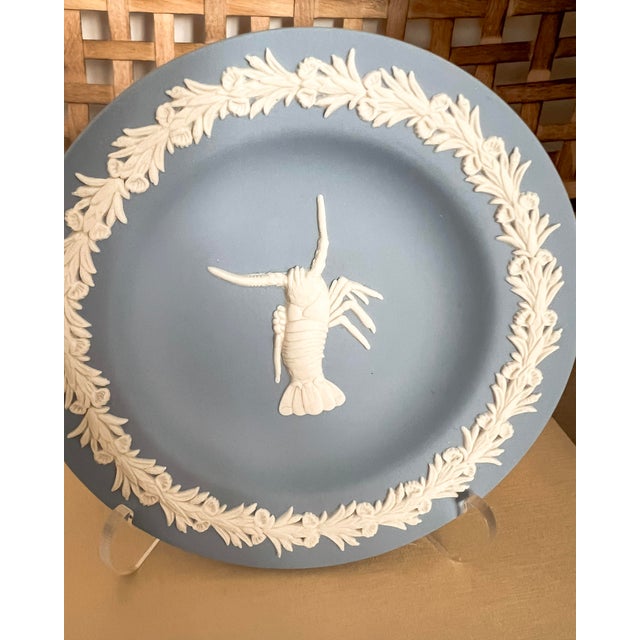 A highly collectible coastal treasure by Wedgwood, this rare Jasperware trinket dish features an elegant raised crawfish...