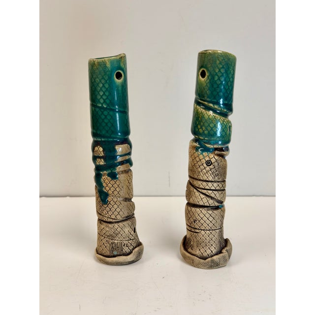 Vintage green-glazed candlesticks from the Richard Marshall Pottery. Perfect for collectors of rustic or medieval-style...