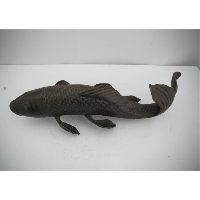 Japanese Bronze koi fish sculpture, most likely dating from Meiji era. Highly detailed, featuring individual scales, fins,...