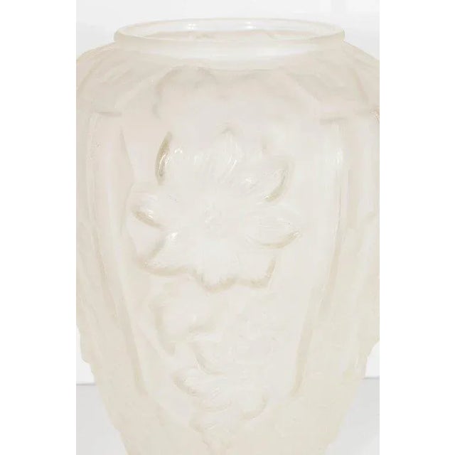 Thus stunning relief frosted vase features stylized cubist geometric and floral designs. A great accent piece that would...