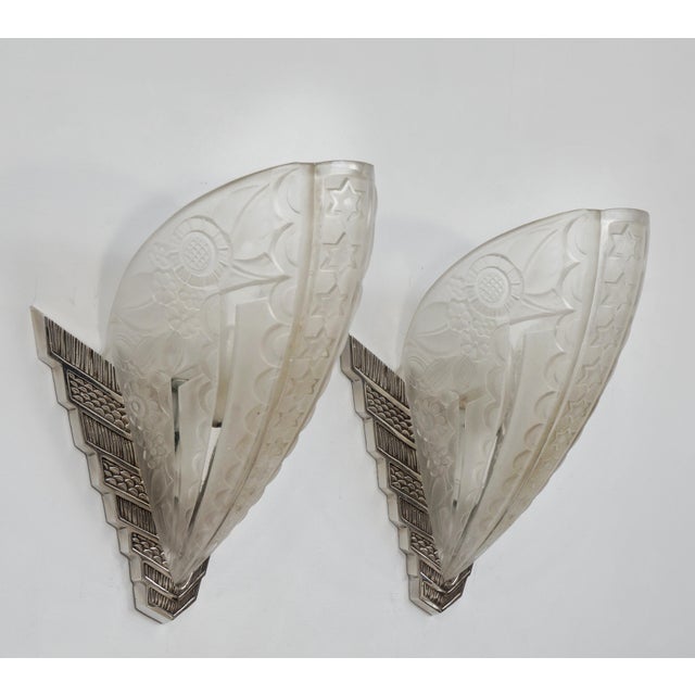 Donna Paris A rare pair of 1925-1930 French art deco wall sconces in nickel on cast solid brass or bronze holding large...