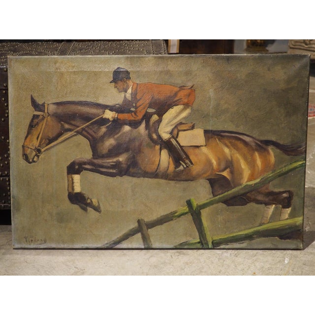 More information coming soon… Dating to the early 1900s, this oil on canvas painting depicts a hunter on horseback jumping...