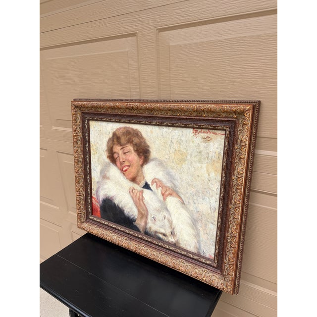 An elegant and beautifully executed antique oil on canvas portrait by the Italian artist Adolfo Belimbau (1845–1938),...