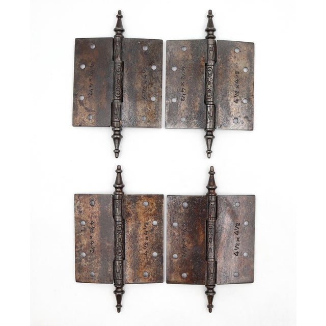 These Victorian door hinges are made of solid cast iron with steeple tips, three knuckles, and a template hole pattern....