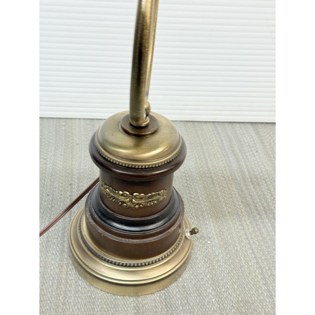 Design Plus Gallery presets a Vintage Gooseneck Library or Bankers Lamp. Elegant curved lines and patina brass trimmed...