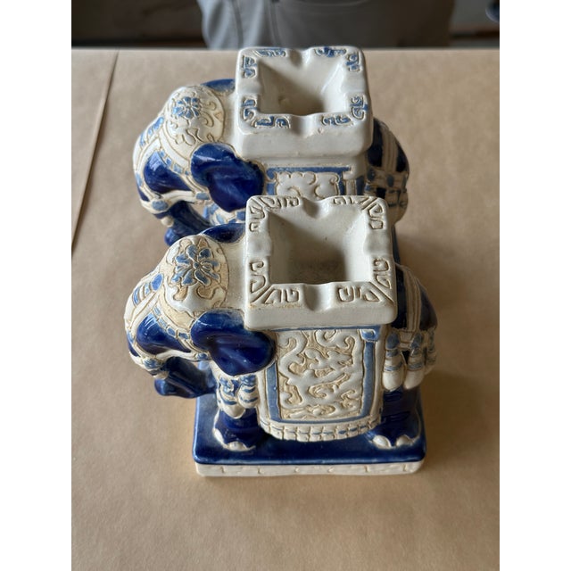 Vintage ceramic elephant glazed candle holders (Pair) One side of the top has blue coloring and one is uncolored 5.5"H...