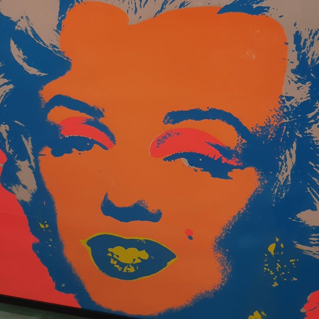 We are offering for sale an iconic 20th-century artwork: a large polychrome silkscreen print depicting marilyn monroe,...