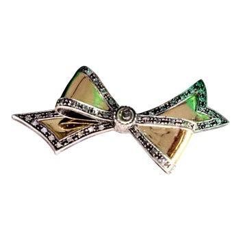 Gold and Silver Bow-Shaped Brooch with Diamond Chips For Sale