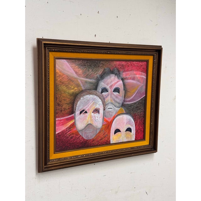 Design Plus Gallery presents a Framed Acrylic Painting. The painting depicts three expressive mask forms set against...