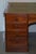 Victorian 4-Sided Pedestal Desk in Flamed Hardwood & Green Leather For Sale - Image 16 of 18