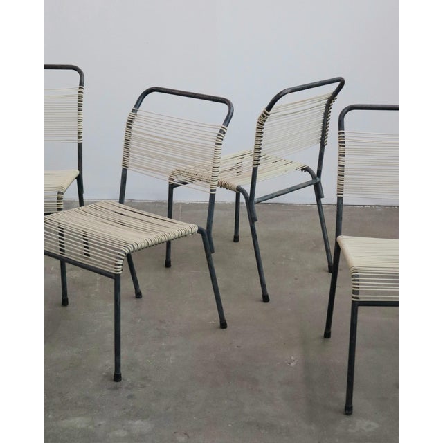 classic mid century outdoor chairs, manufactured in the 1960s and reminiscent of walter lamb’s designs 31 1/2” h 17” w 17”...