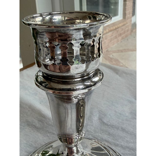 Elegant pair of vintage Towle sterling silver weighted and reinforced candlesticks featuring pierced gallery candle cups,...