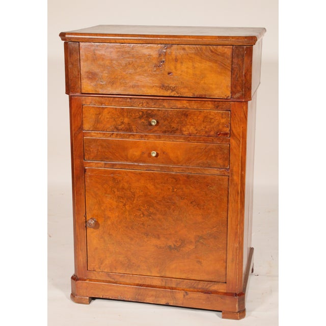 Antique Louis Philippe style, burl walnut, burl elm and beech wood washstand / vanity, 19th century. With a burl walnut...